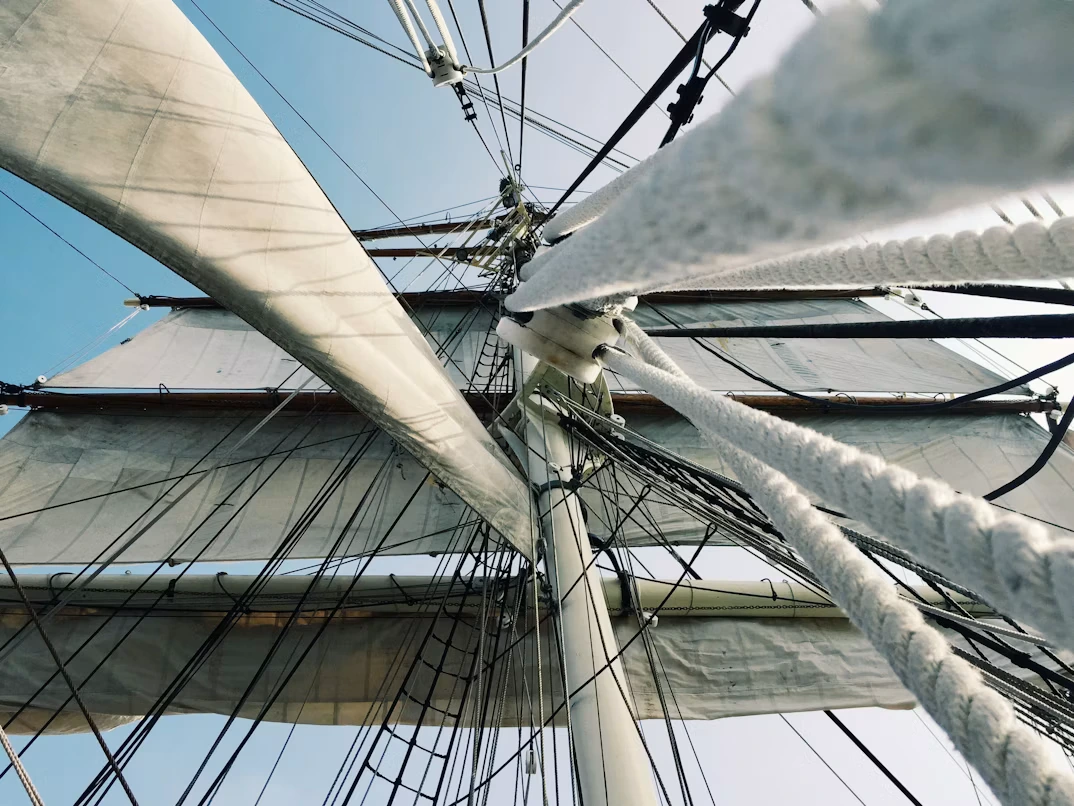 Neatly coiled and stored heavy nautical rope on a ship deck
